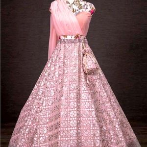 Pink crop top and lengha set with fabric small bag